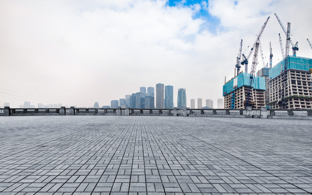 marble platform in front of the city skyline