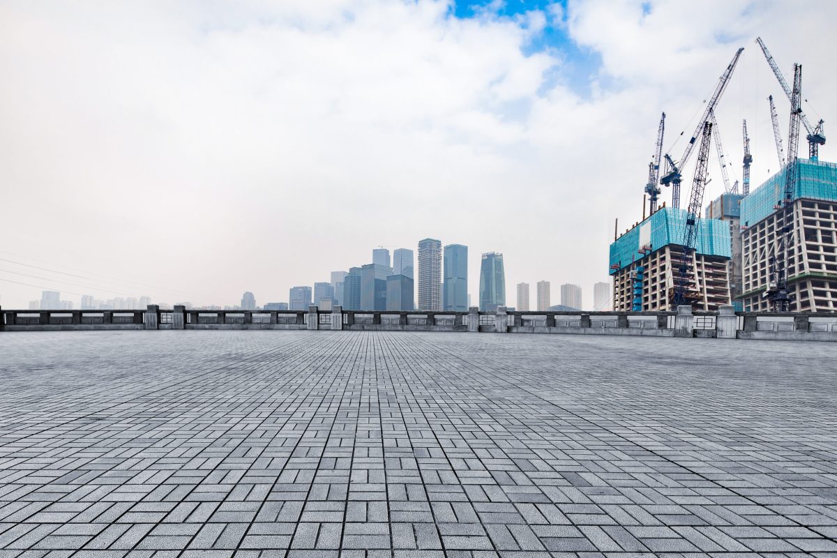 marble platform in front of the city skyline